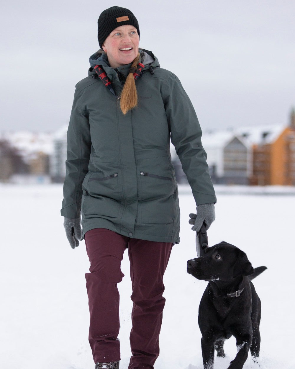Urban Grey coloured Pinewood Womens Wilda Parka on snow background