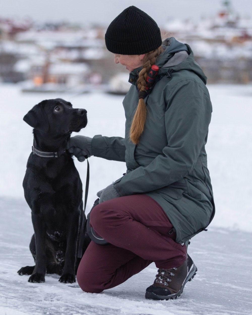 Urban Grey coloured Pinewood Womens Wilda Parka on snow background