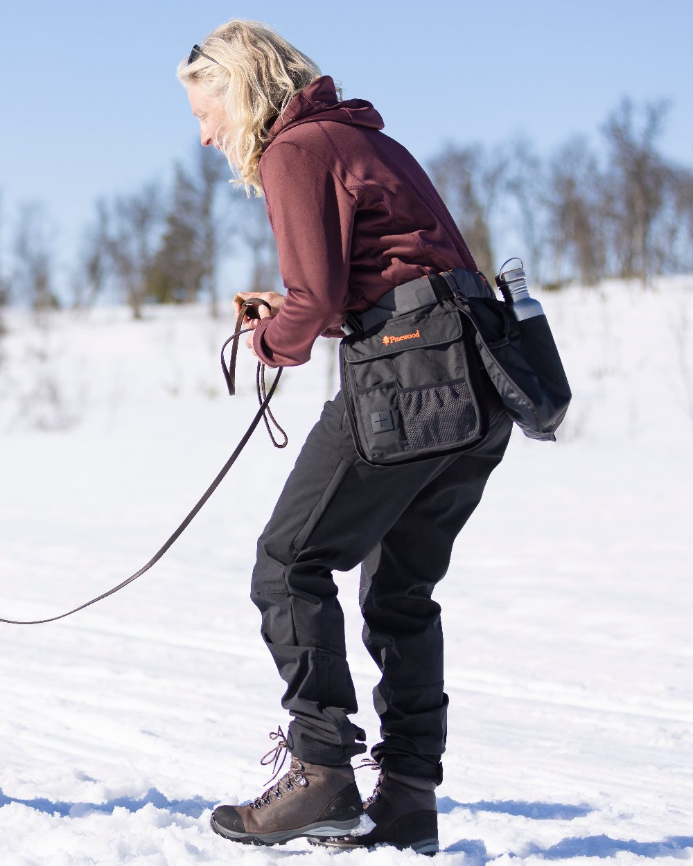 Black Coloured Pinewood Womens Wilda Stretch Shell Trousers on outdoor background