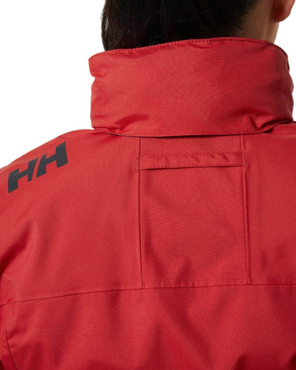 Red Coloured Helly Hansen Womens Crew Hooded Midlayer Sailing Jacket 2.0 On A White Background 