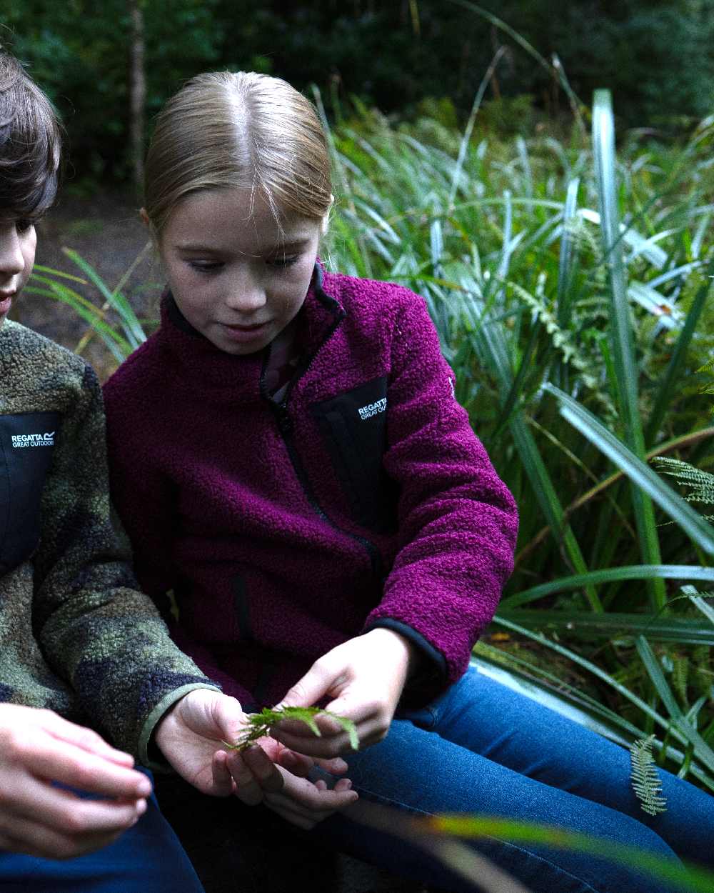 Dark Pimento Coloured Regatta Childrens Frankie Warm Full Zip Fleece Jacket on outdoor background