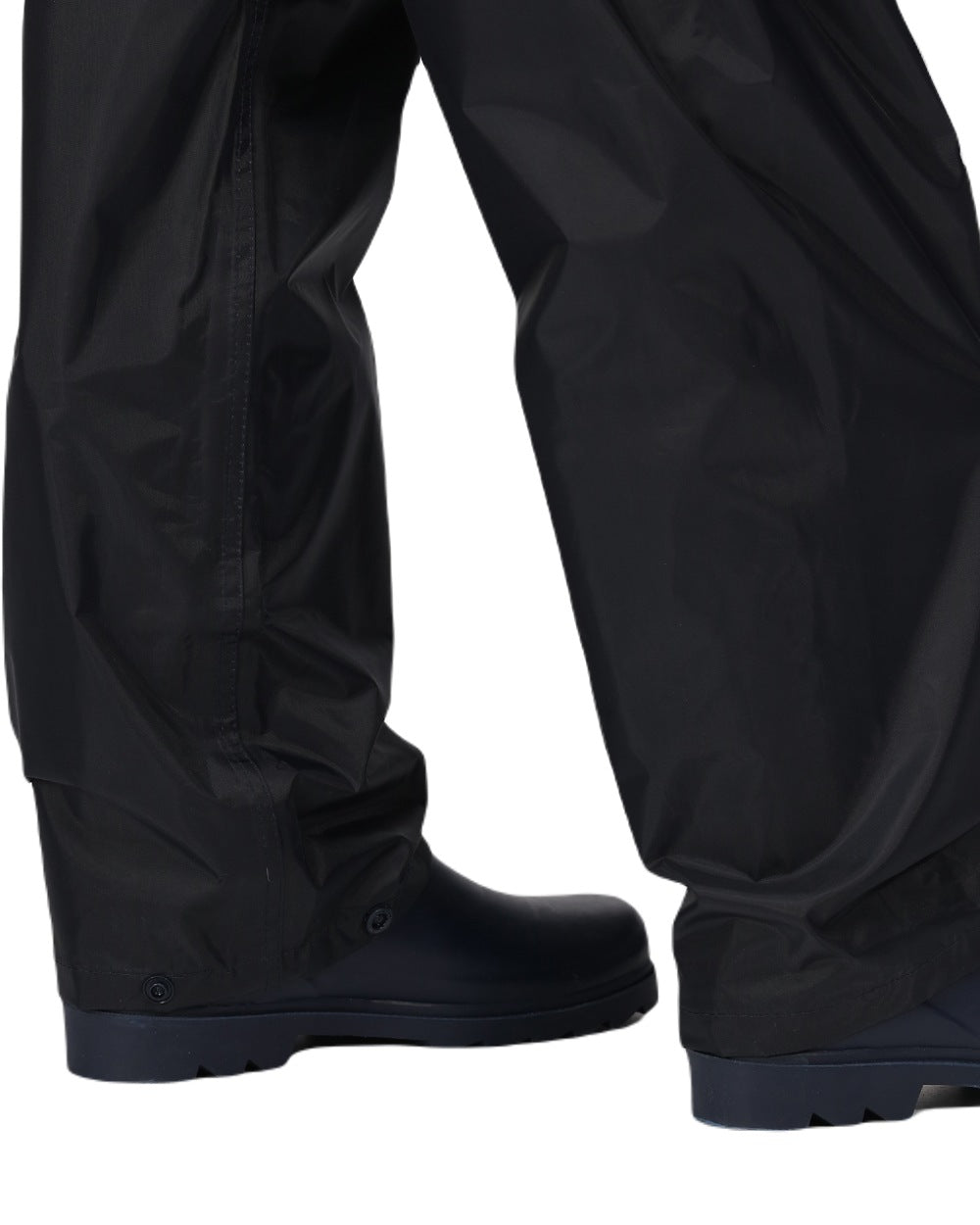Black coloured Regatta Kids Pro Stormbreak Waterproof Overtrousers on white background