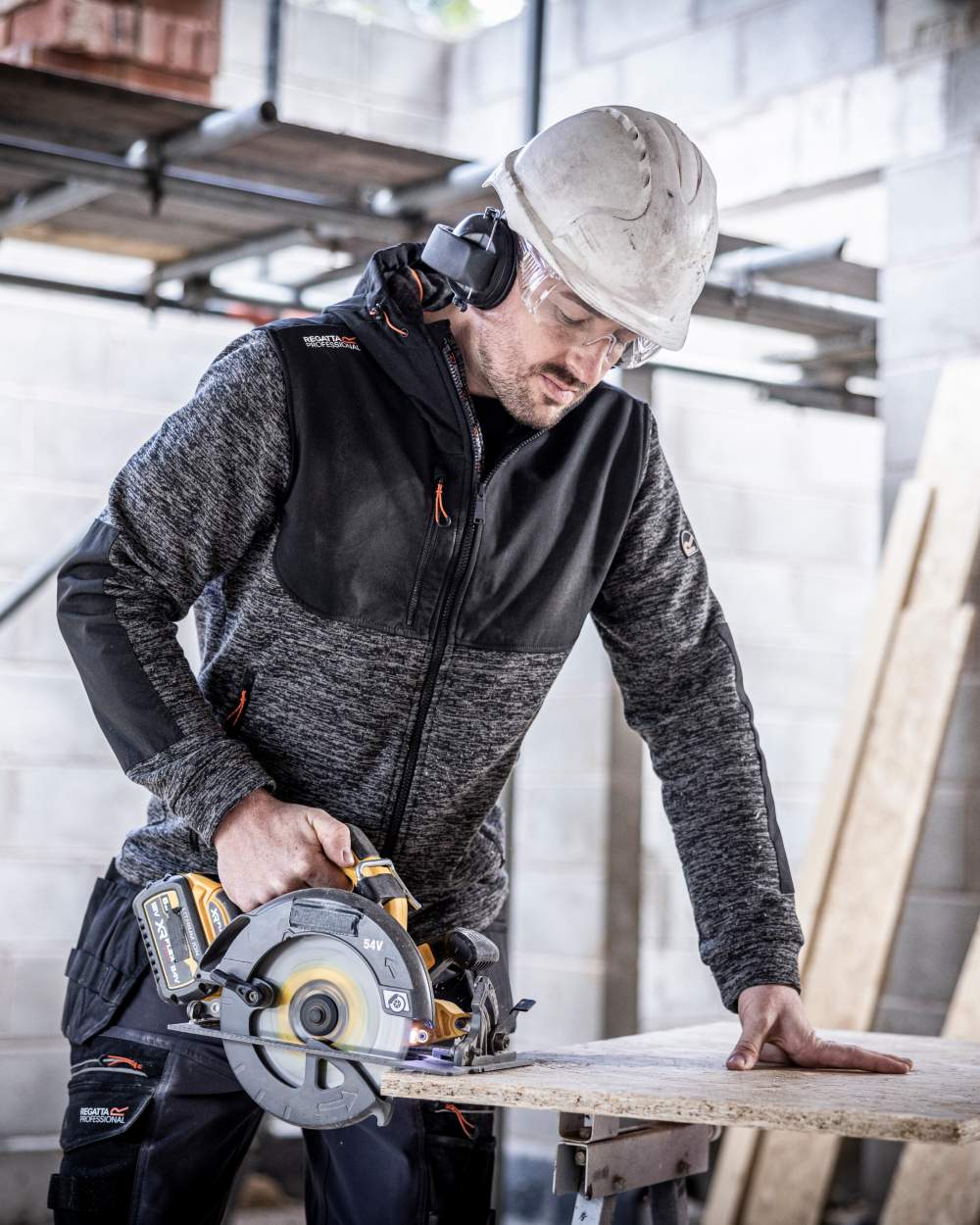 Ash Marl Black coloured Regatta Mens Heist Hybrid Jacket on blurry background