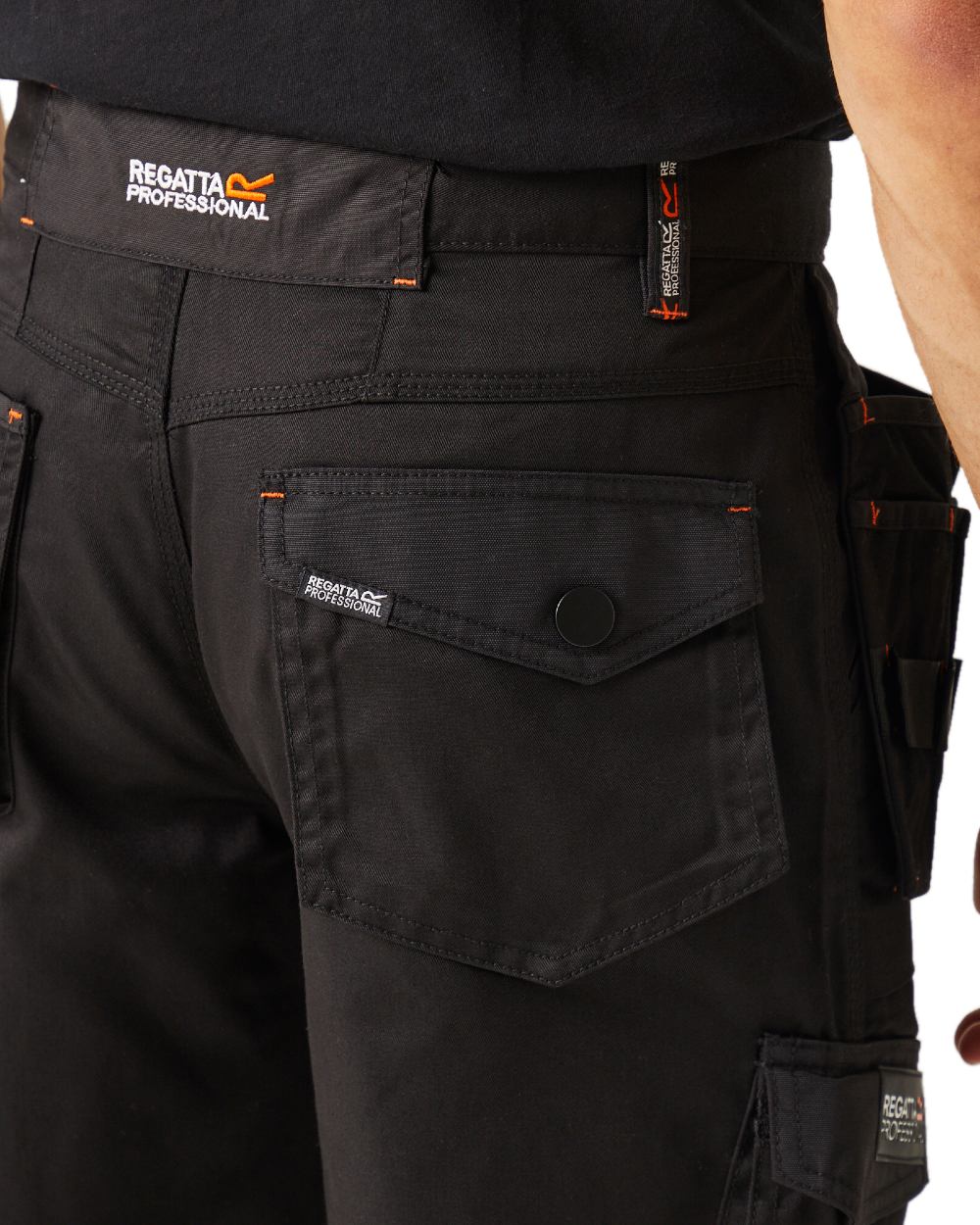 Black coloured Regatta Mens Incursion Work Trousers on white background