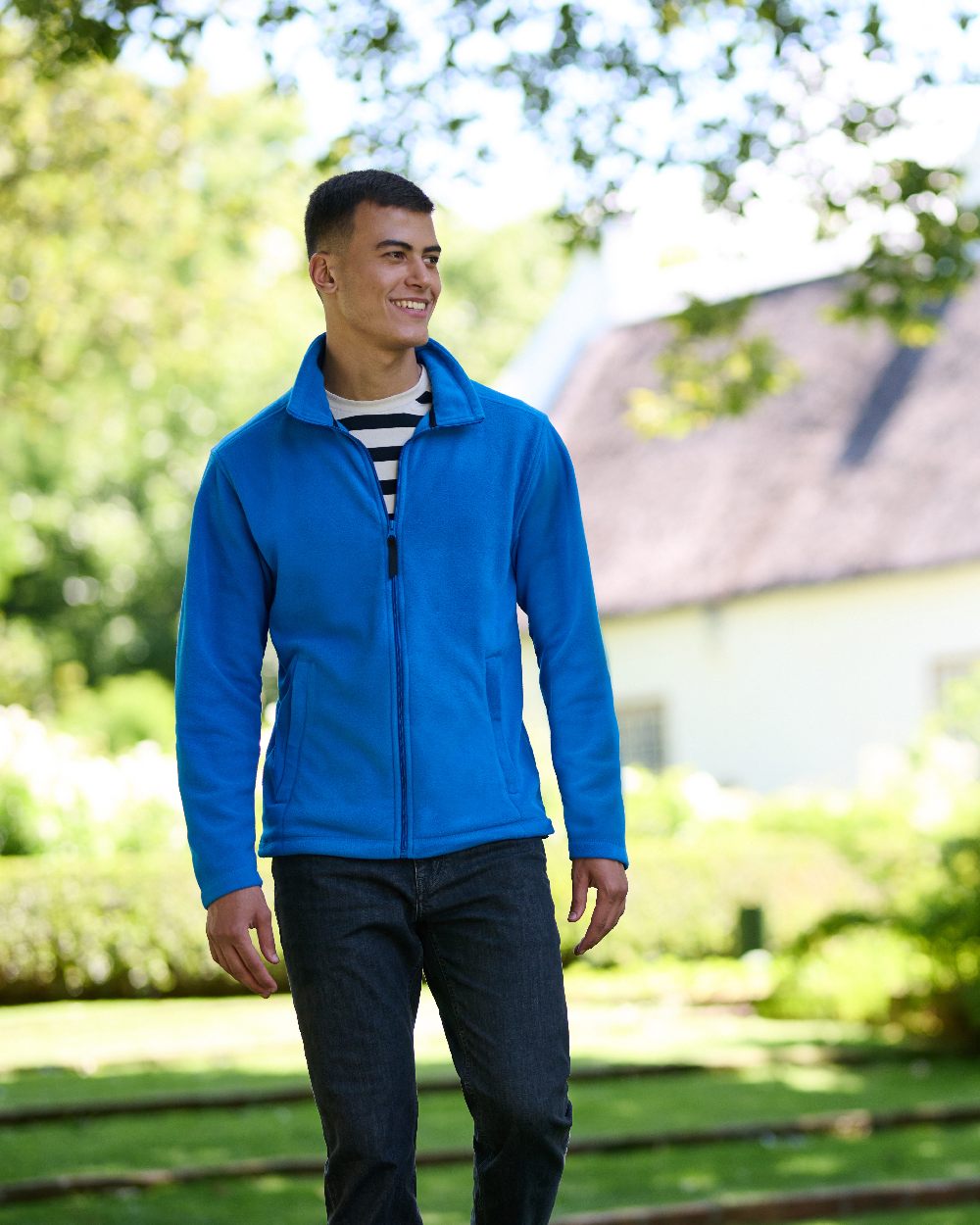 Oxford Blue coloured Regatta Mens Micro Lightweight Full Zip Fleece on garden background