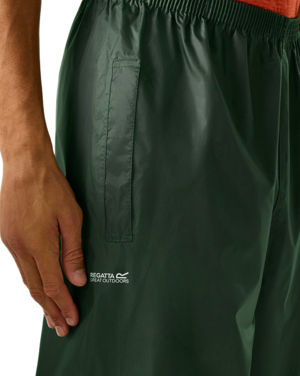 Dark Olive Coloured Regatta Mens Stormbreak Waterproof Overtrousers on white background