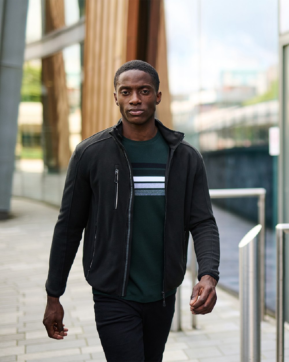 Black coloured Regatta Omicron III Waterproof Breathable Fleece on blurry background