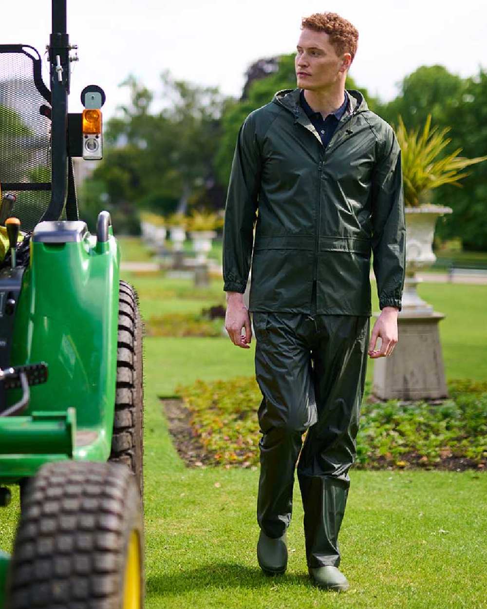 Dark Olive Coloured Regatta Pro Stormbreak Waterproof Overtrousers on outdoor background