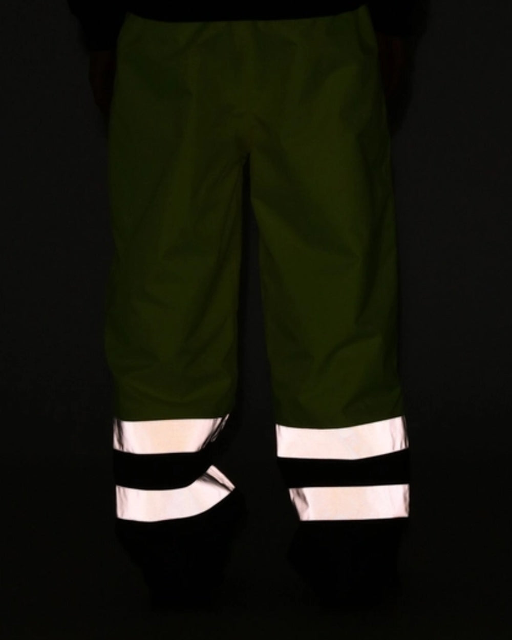 Yellow Navy coloured Regatta Professional HI-VIS PRO Two Tone Insulated Overtrouser on dark background
