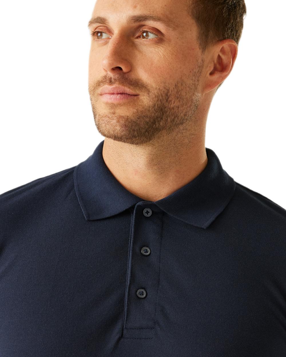 Navy coloured Regatta Professional Mens 65/35 Long Sleeves Polo Top on white background