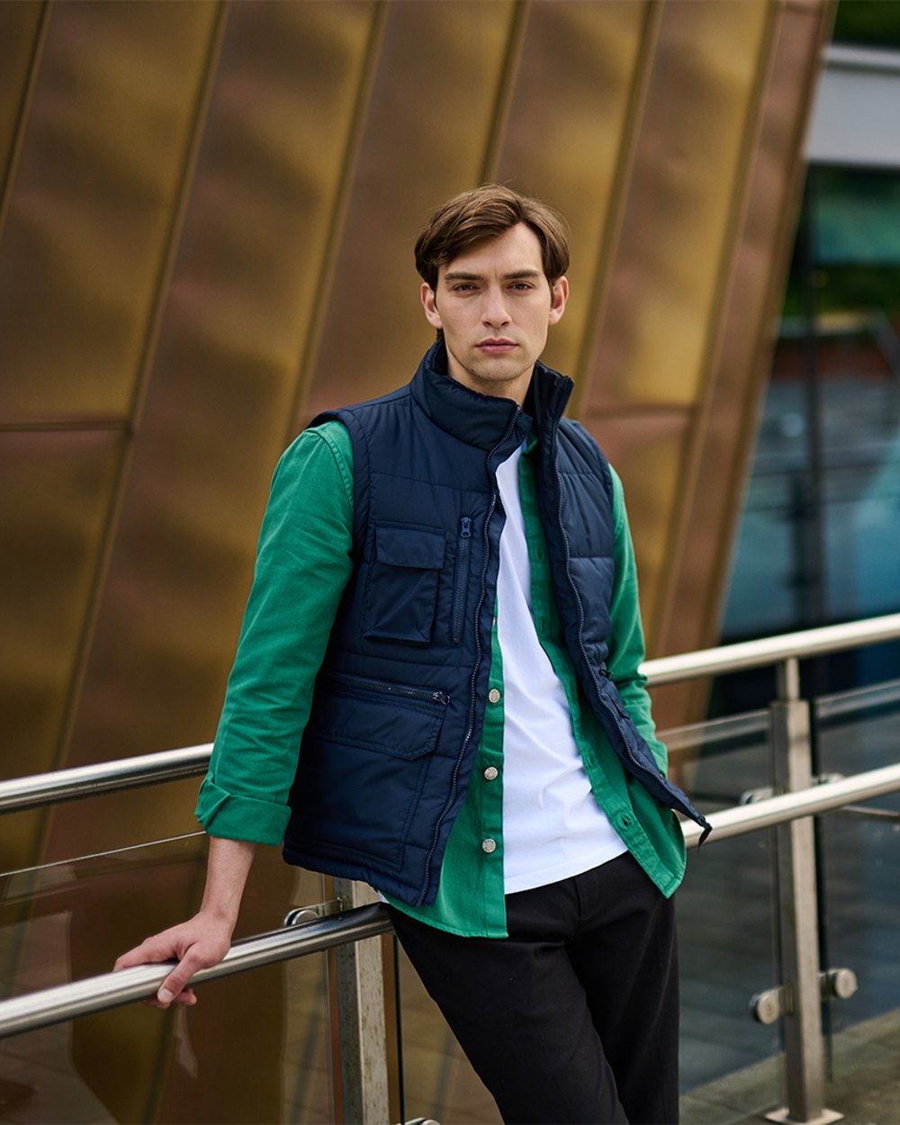 Navy coloured Regatta Steller Multi-Zip Ripstop Bodywarmer on blurry background