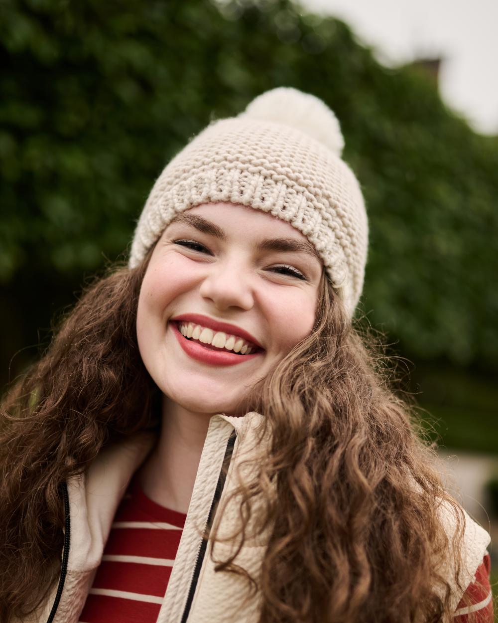 Light Vanilla Coloured Regatta Womens Lovella VI Hat on outdoor background