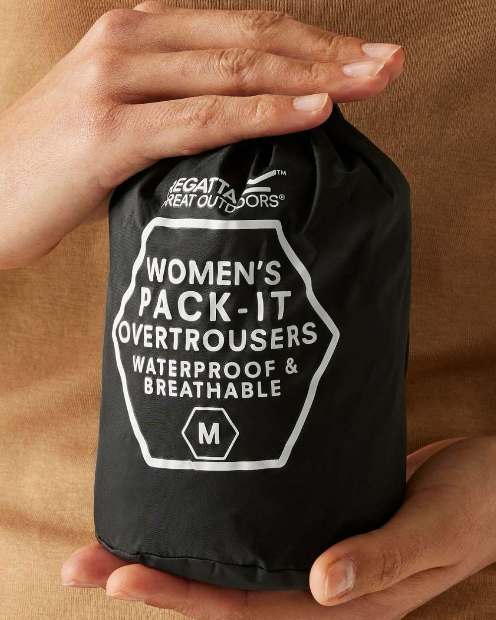 Black Coloured Regatta Womens Pack It Waterproof Overtrousers on white background