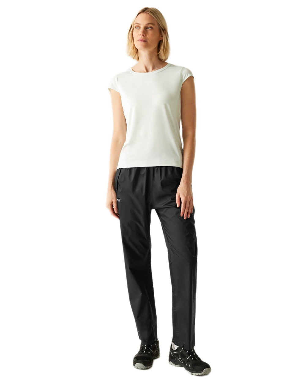 Black Coloured Regatta Womens Pack It Waterproof Overtrousers on white background