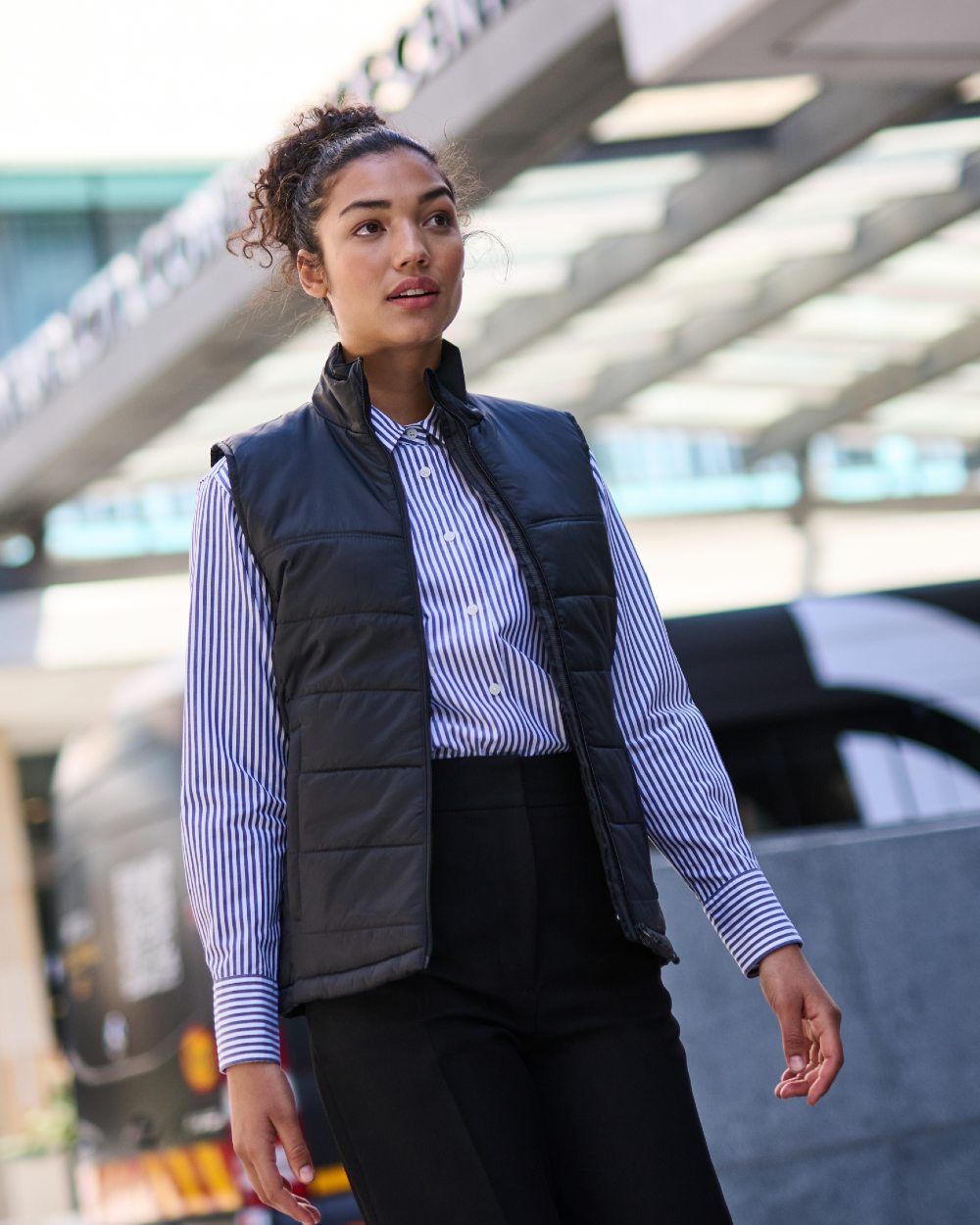 Black coloured Regatta Womens Stage II Insulated Bodywarmer on blurry background