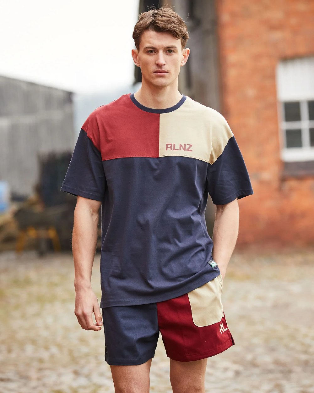 Navy Multi coloured Ridgeline Backslider Shorts on blurry background