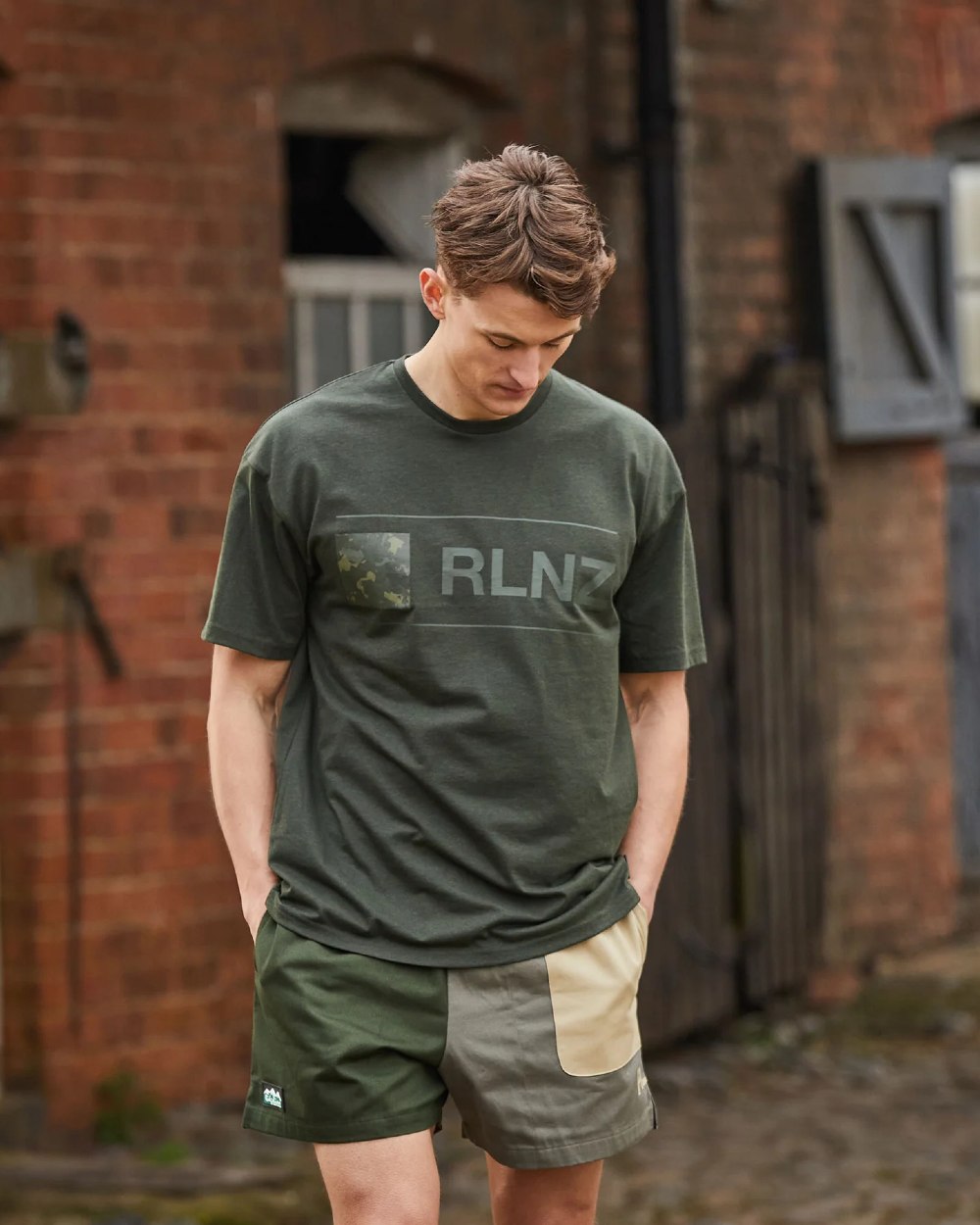 Olive Multi coloured Ridgeline Backslider Shorts on house background