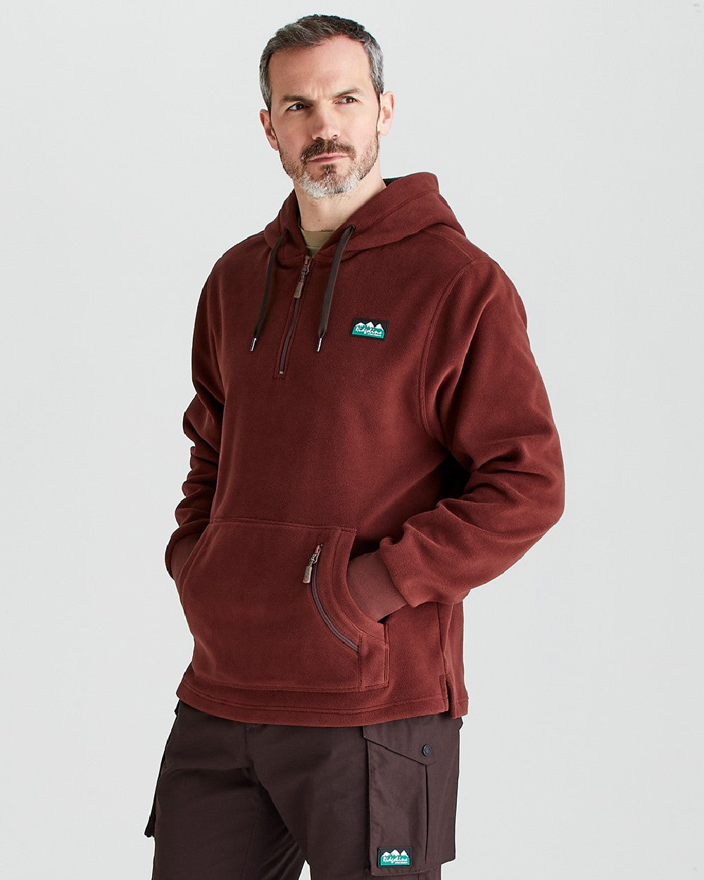 Oxblood coloured Ridgeline Ballistic Hooded Fleece on grey background