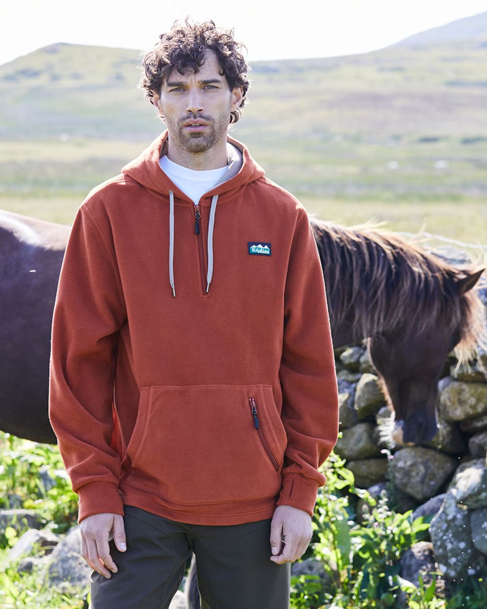 Russet coloured Ridgeline Ballistic Hooded Fleece on outdoor background
