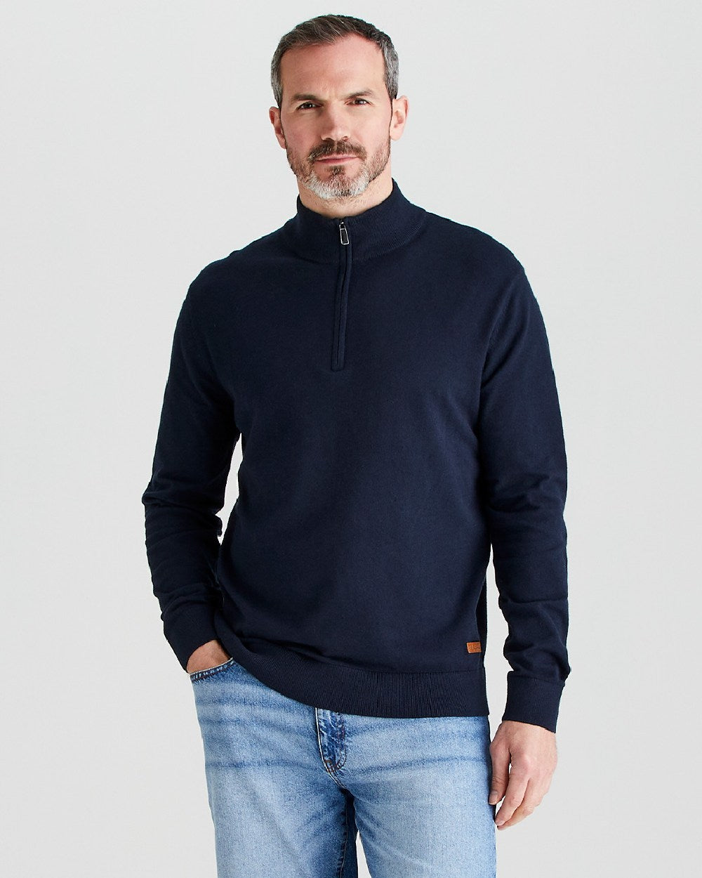 Navy coloured Ridgeline Hartland 1/4 Zip Pullover on grey background
