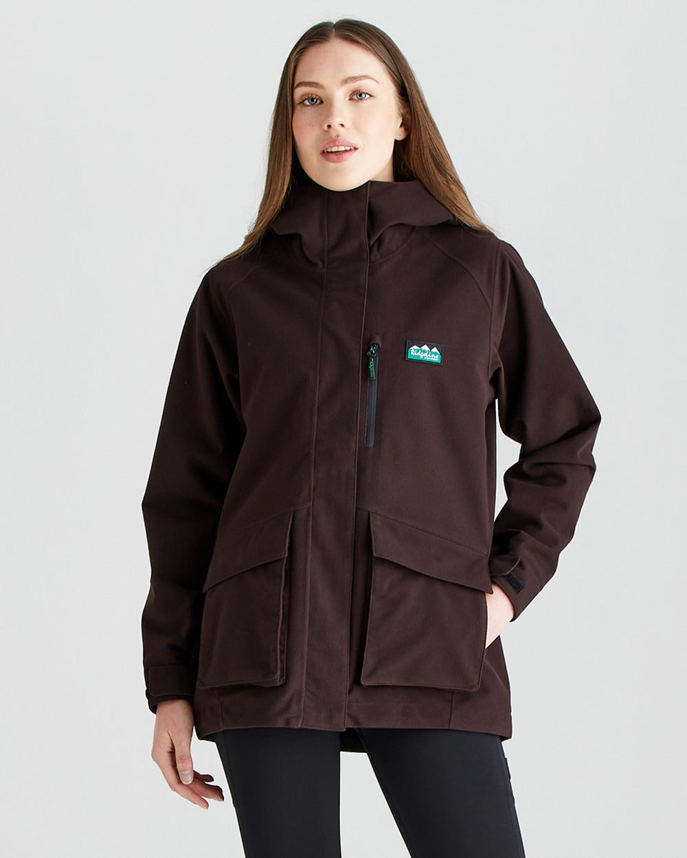 Deep Bark coloured Ridgeline Ladies Rhea Jacket on grey background