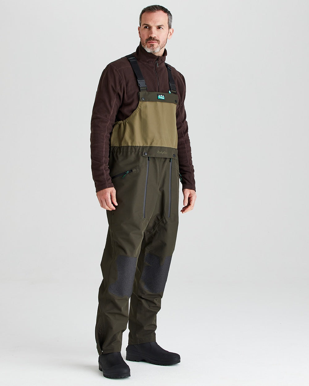 Deep Forest coloured Ridgeline Mens Agri Pro Bib & Brace on grey background