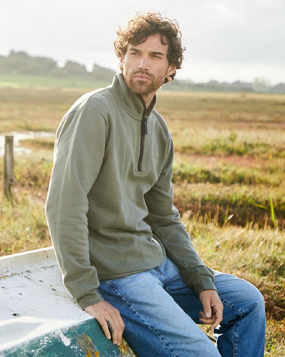 Smokey Olive Coloured Ridgeline Mens Brancaster Quarter Zip Top on outdoor background