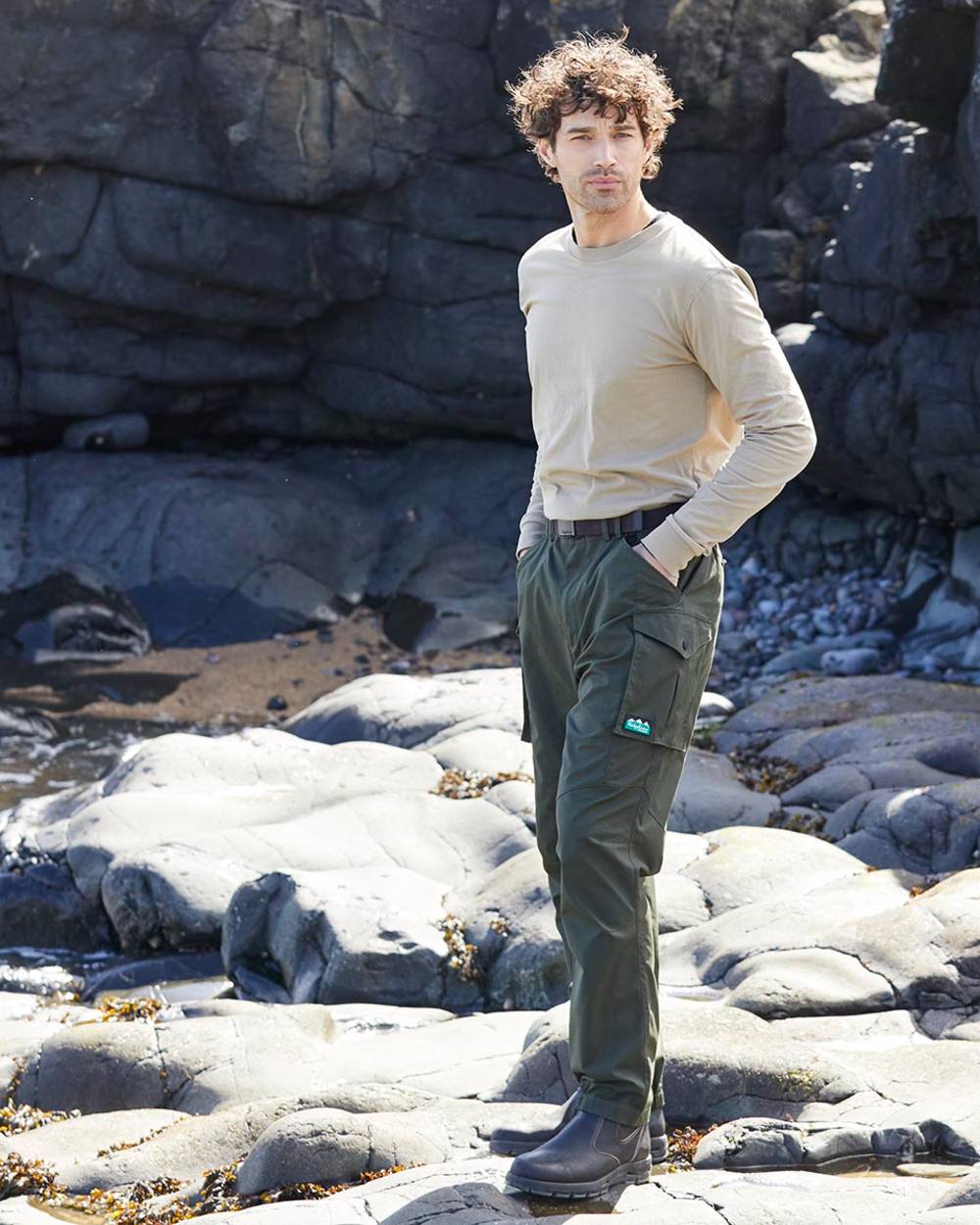 Deep Forest coloured Ridgeline Mens Grafter Trousers on shore background
