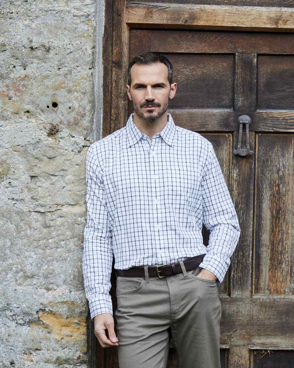 Navy coloured Ridgeline Mens Sedgebrook Shirt on door background