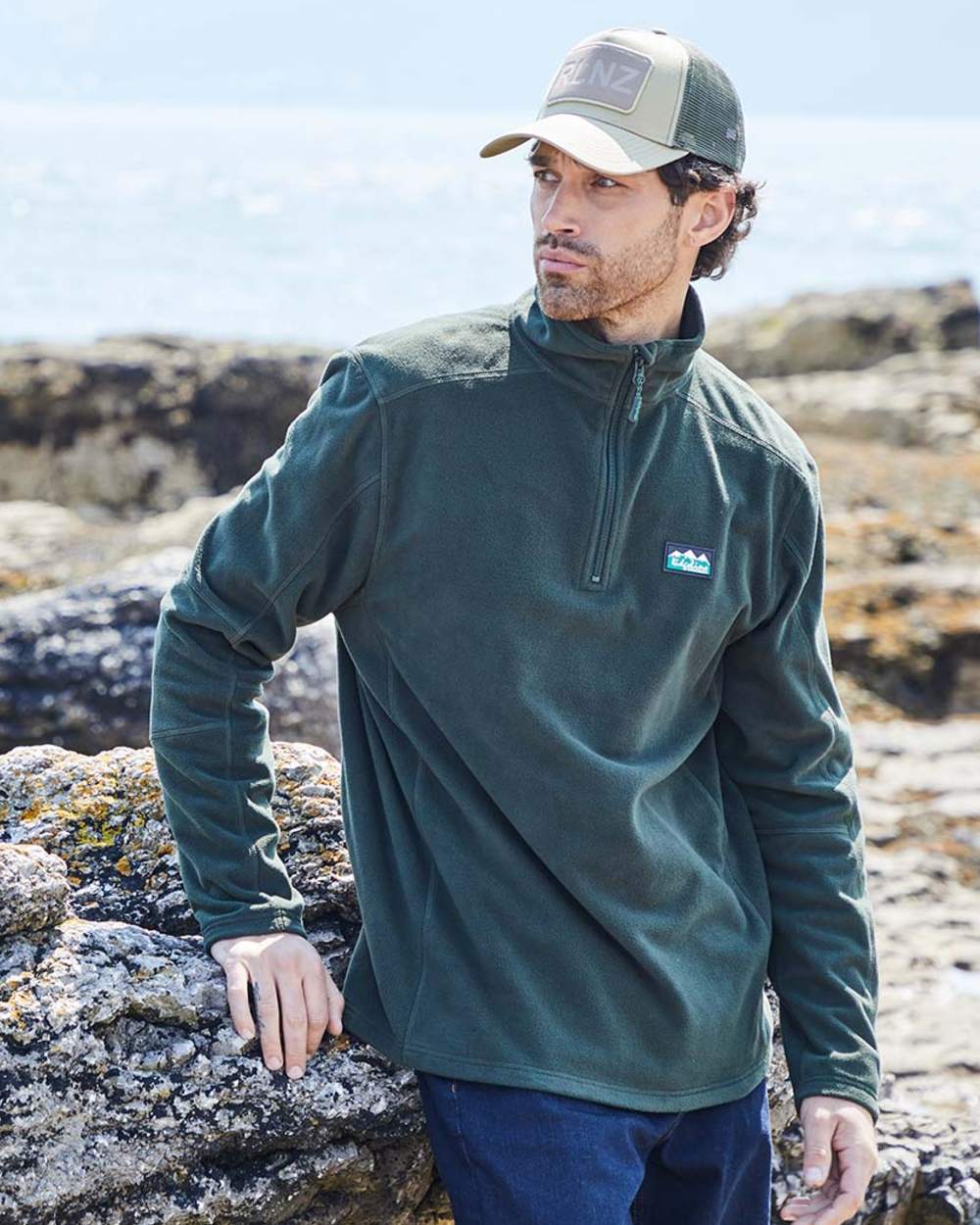 Deep Forest coloured Ridgeline Narvik Fleece on sea background