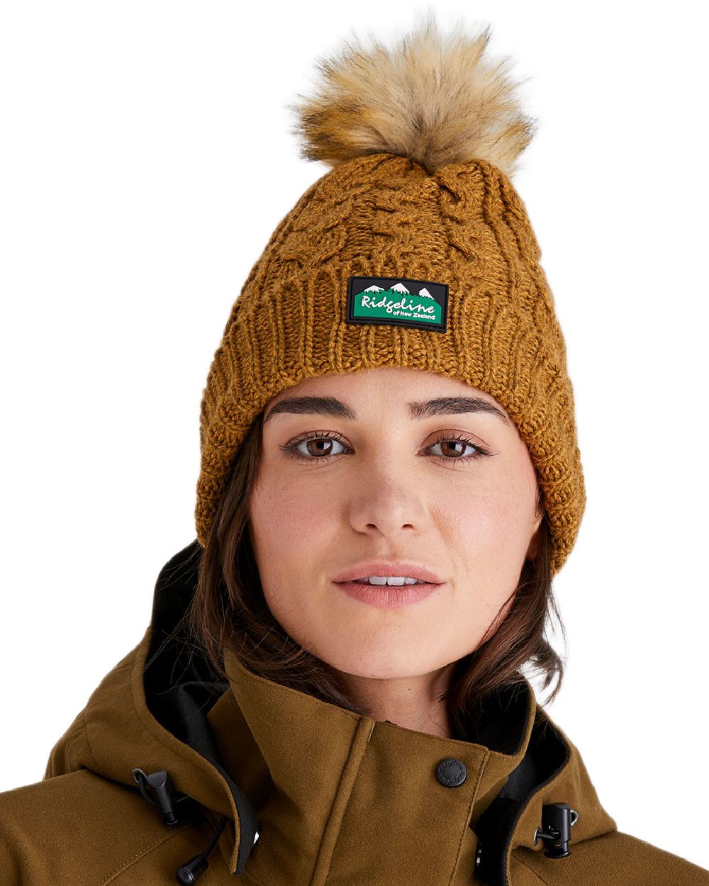 Ochre Coloured Ridgeline Nordic Fleck Bobble Hat on white background