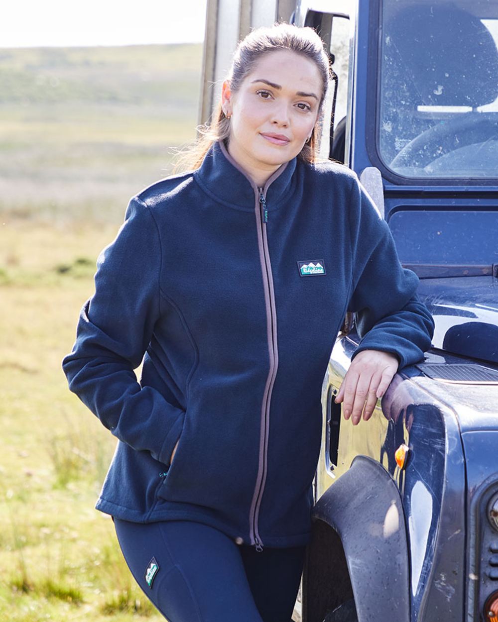 Navy coloured Ridgeline Womens Brenna Fleece Jacket on outdoor background