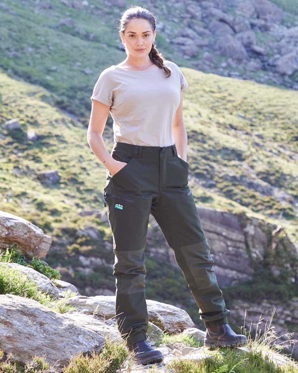 Deep Forest coloured Ridgeline Womens Cambrian Trousers on outdoor background