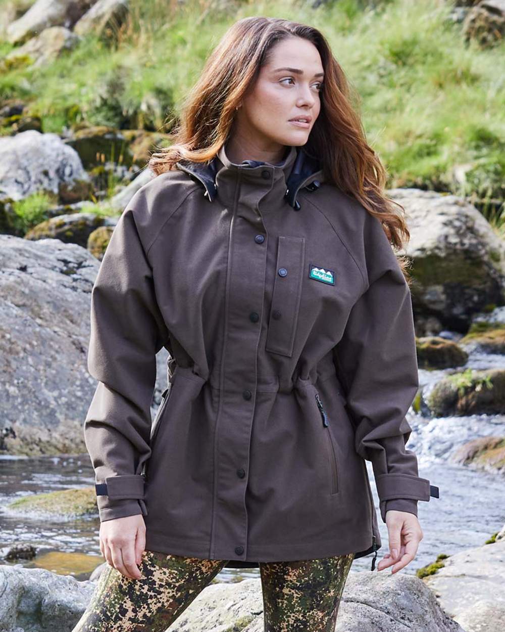 Bark coloured Ridgeline Womens Monsoon Classic Jacket on lake background
