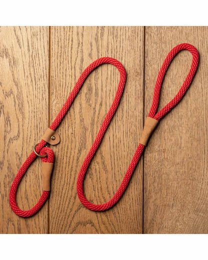 Brick Red coloured Ruff &amp; Tumble Slip Dog Leads on wooden background 