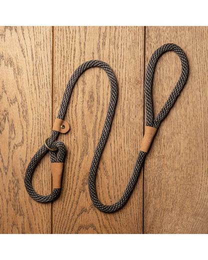 Charcoal coloured Ruff &amp; Tumble Slip Dog Leads on wooden background 