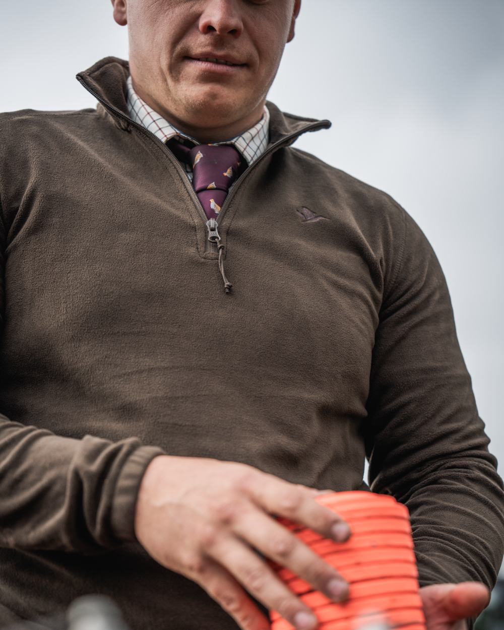 Pine Green Coloured Seeland Benjamin Half Zip Fleece on outdoor background