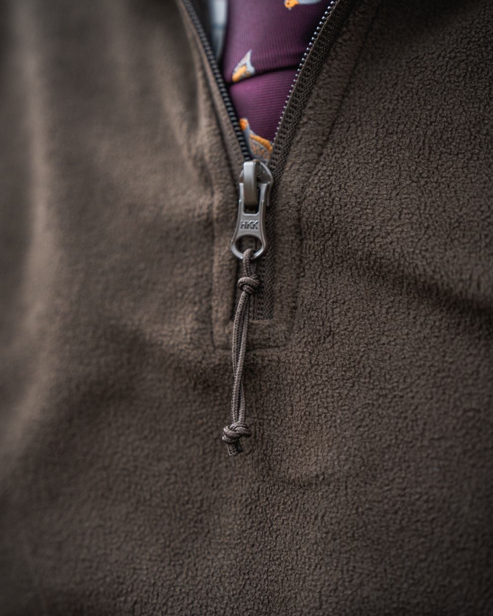 Pine Green Coloured Seeland Benjamin Half Zip Fleece on outdoor background