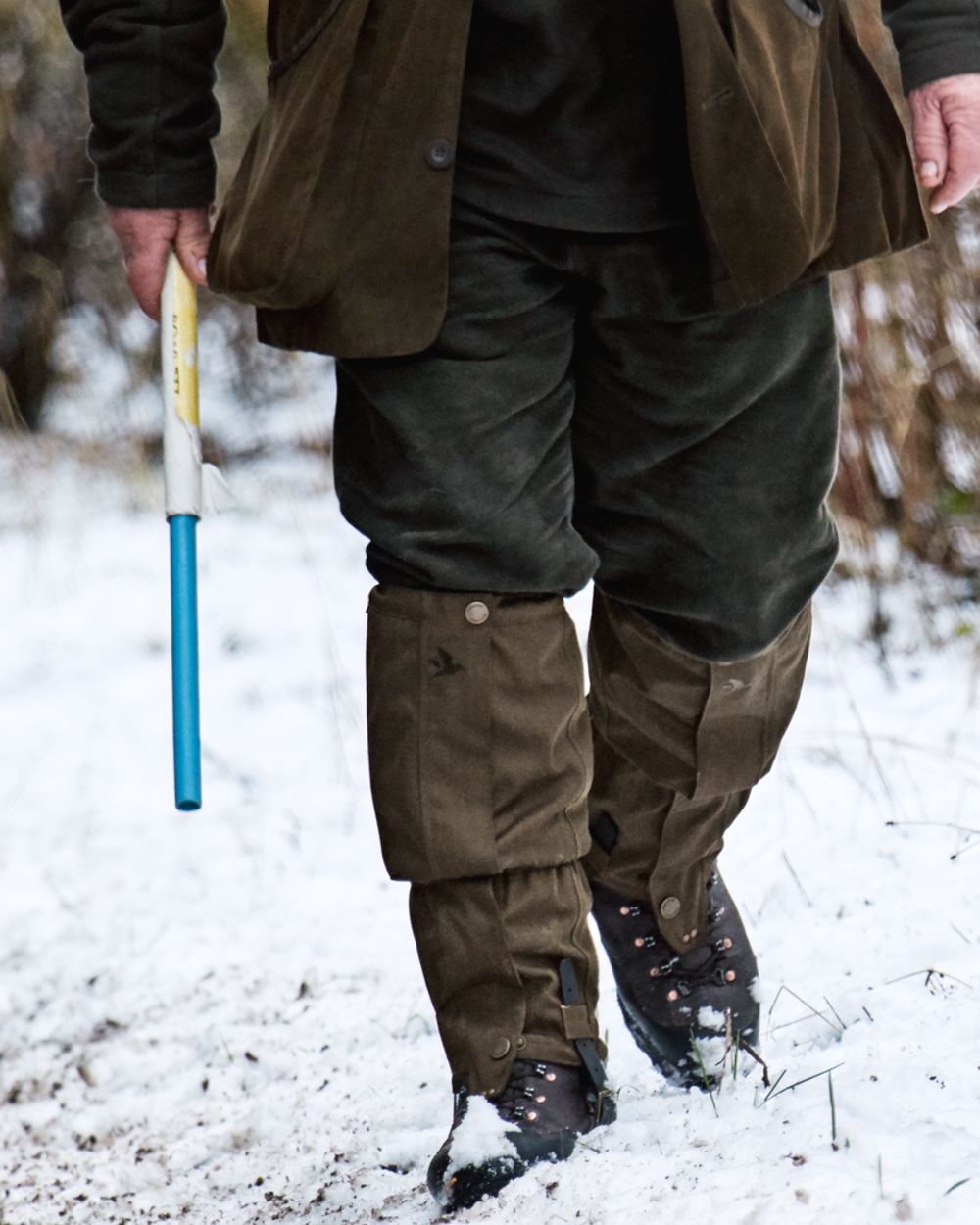 Shaded Olive Coloured Seeland Buckthorn Gaiters on snow background