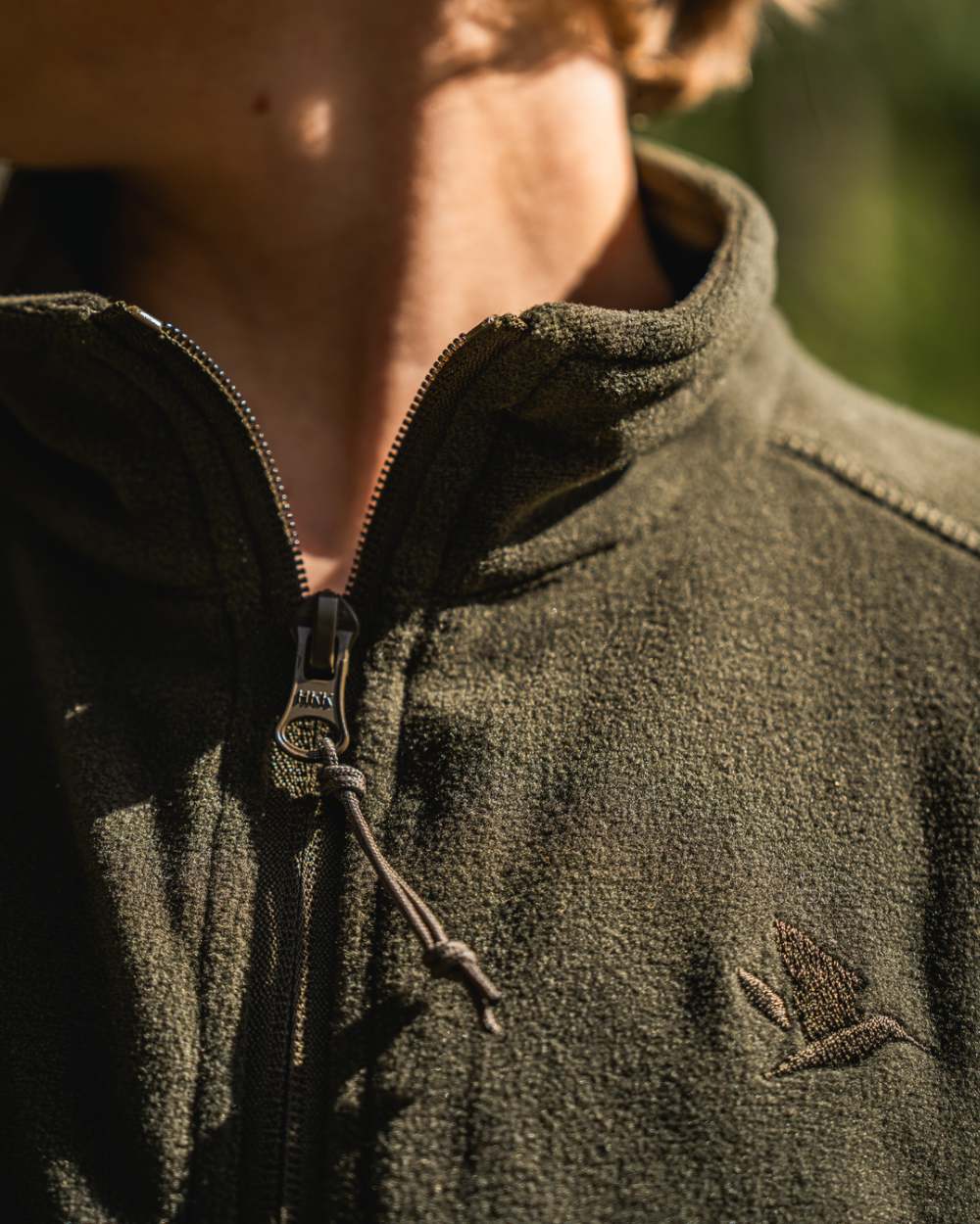 Pine Green Coloured Seeland Childrens Benjamin Fleece on outdoor background