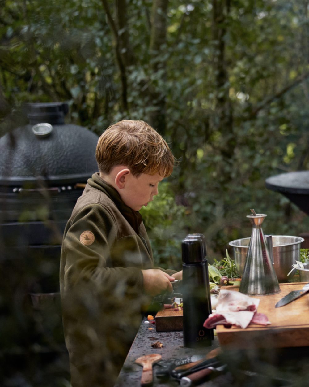 Pine Green Coloured Seeland Childrens Bolt Fleece Jacket on outdoor background