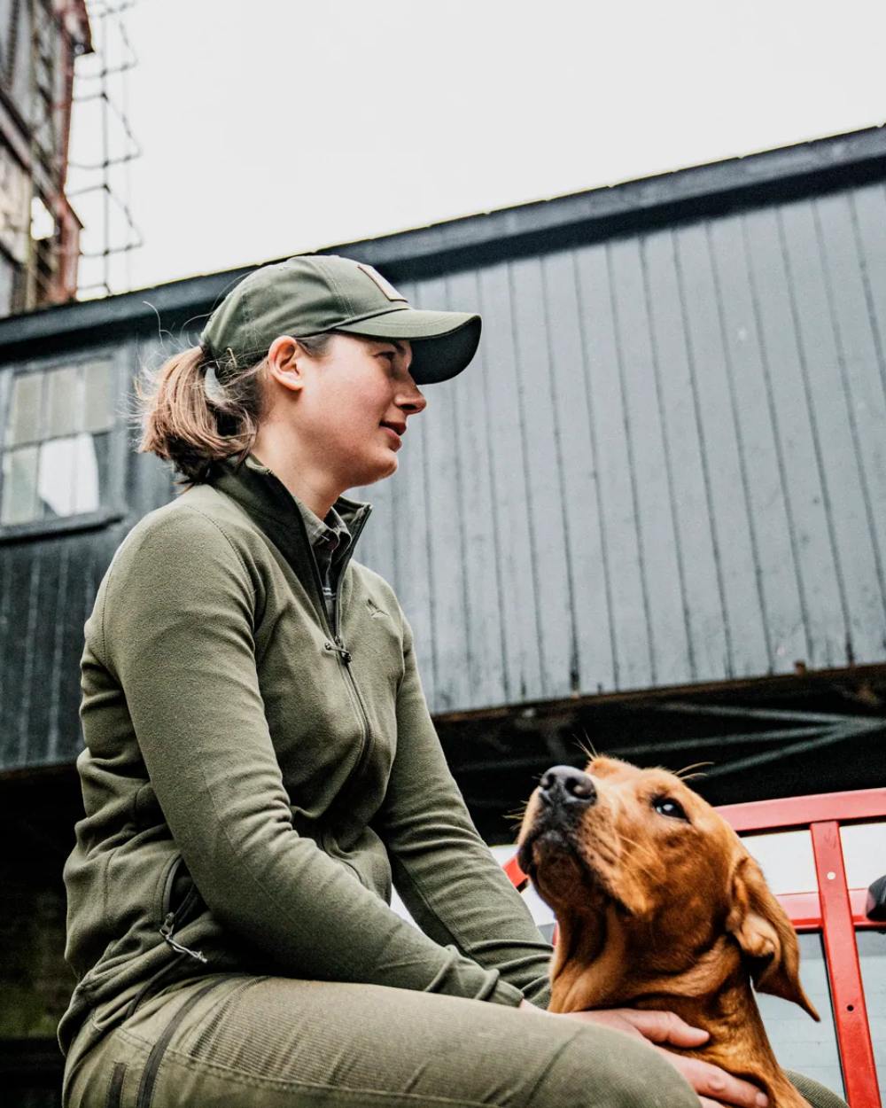 Pine Green Coloured Seeland Dew Fleece Jacket on outdoor background