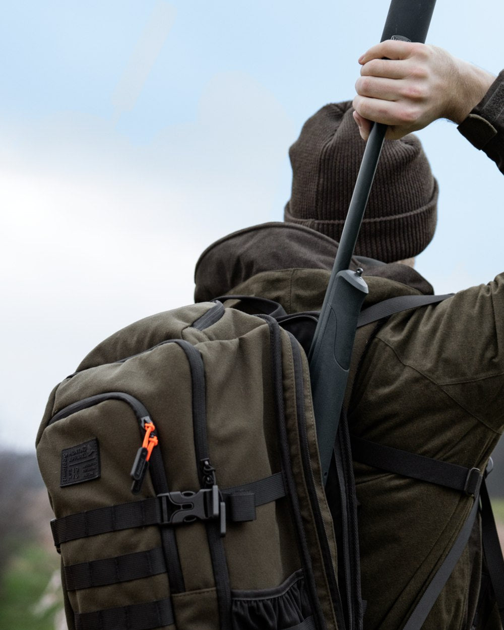 Pine Green coloured Seeland Enduro Backpack on forest background
