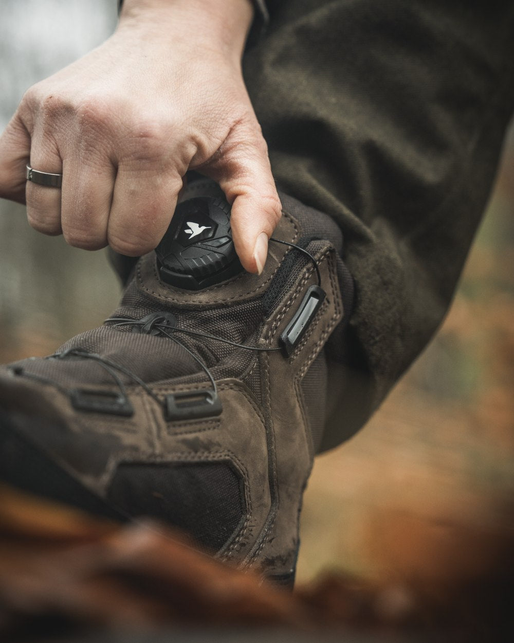 Dark Brown coloured Seeland Enduro Dial Aya Boots on forest background