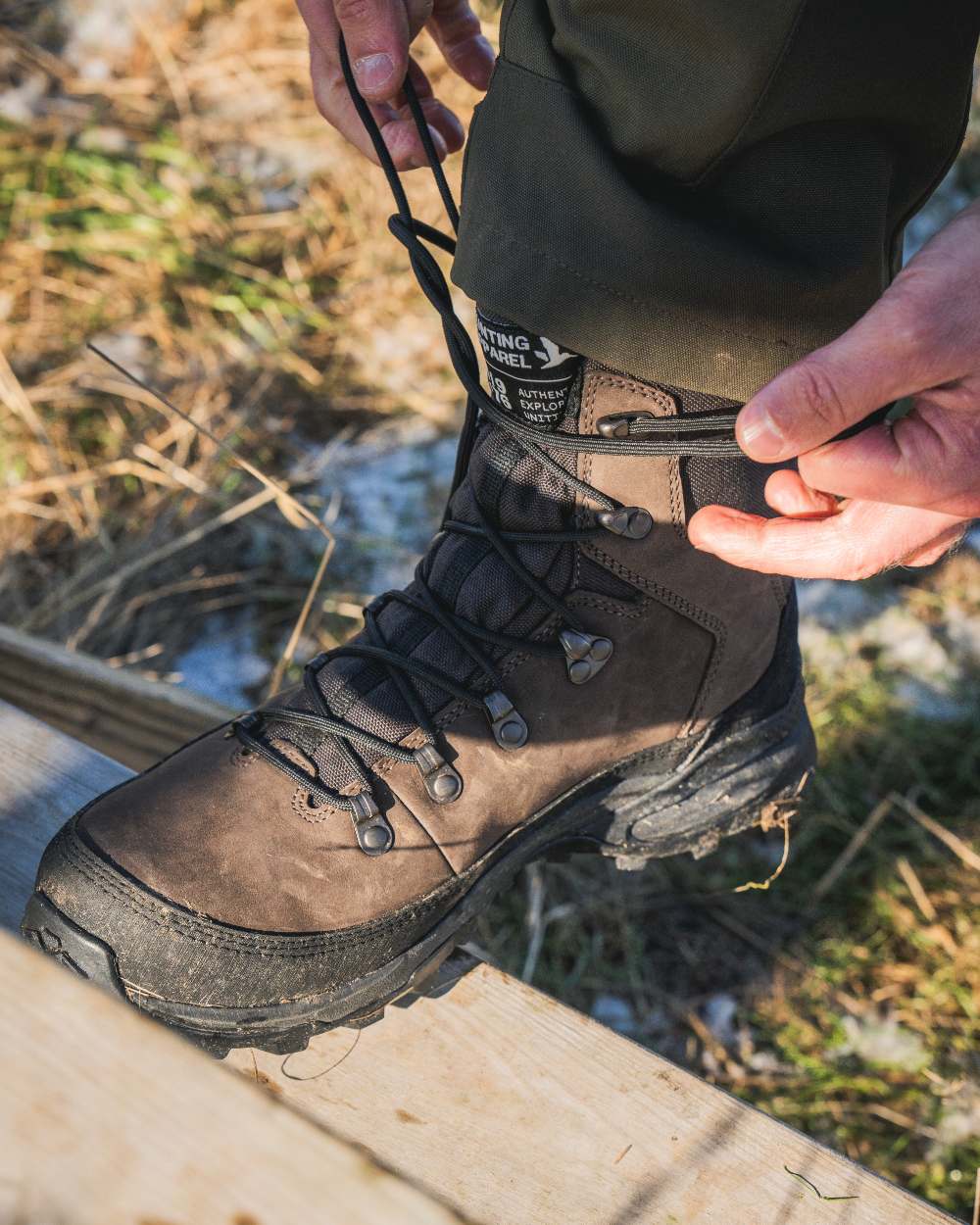 Dark Brown coloured Seeland Enduro Explore Mid Boots on forest background
