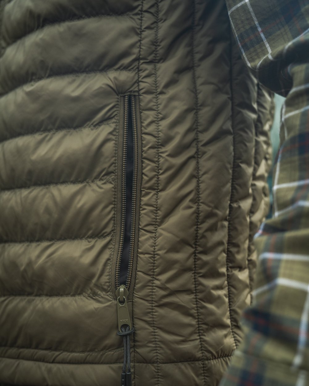 Light Pine Coloured Seeland Fahrenheit Waistcoat on outdoor background