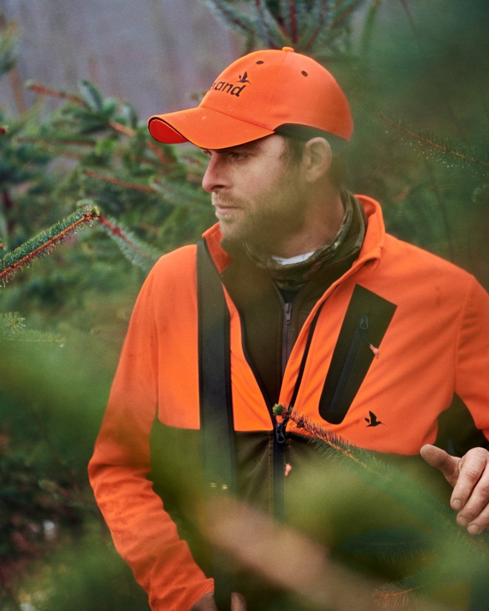 Hi-Vis Orange Coloured Seeland Force Advanced Softshell Jacket on outdoor background