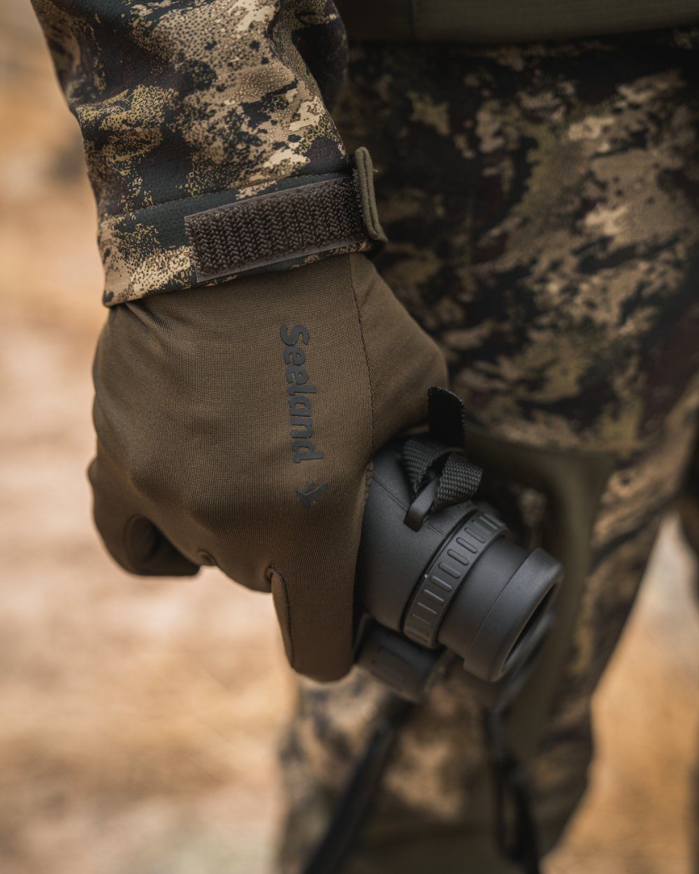 Pine Green Coloured Seeland Grip Gloves on outdoor background