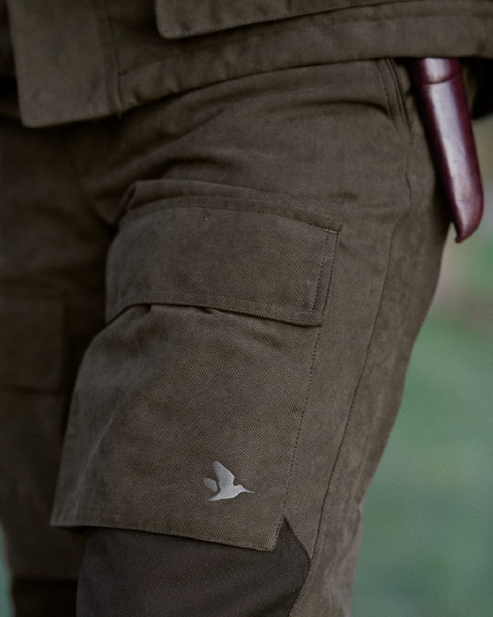 Grizzly Brown Coloured Seeland Helt II Waterproof Trousers on outdoor background