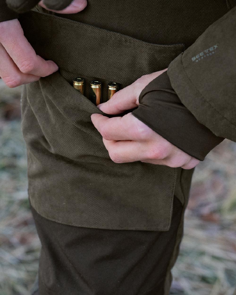 Grizzly Brown Coloured Seeland Helt II Waterproof Trousers on outdoor background